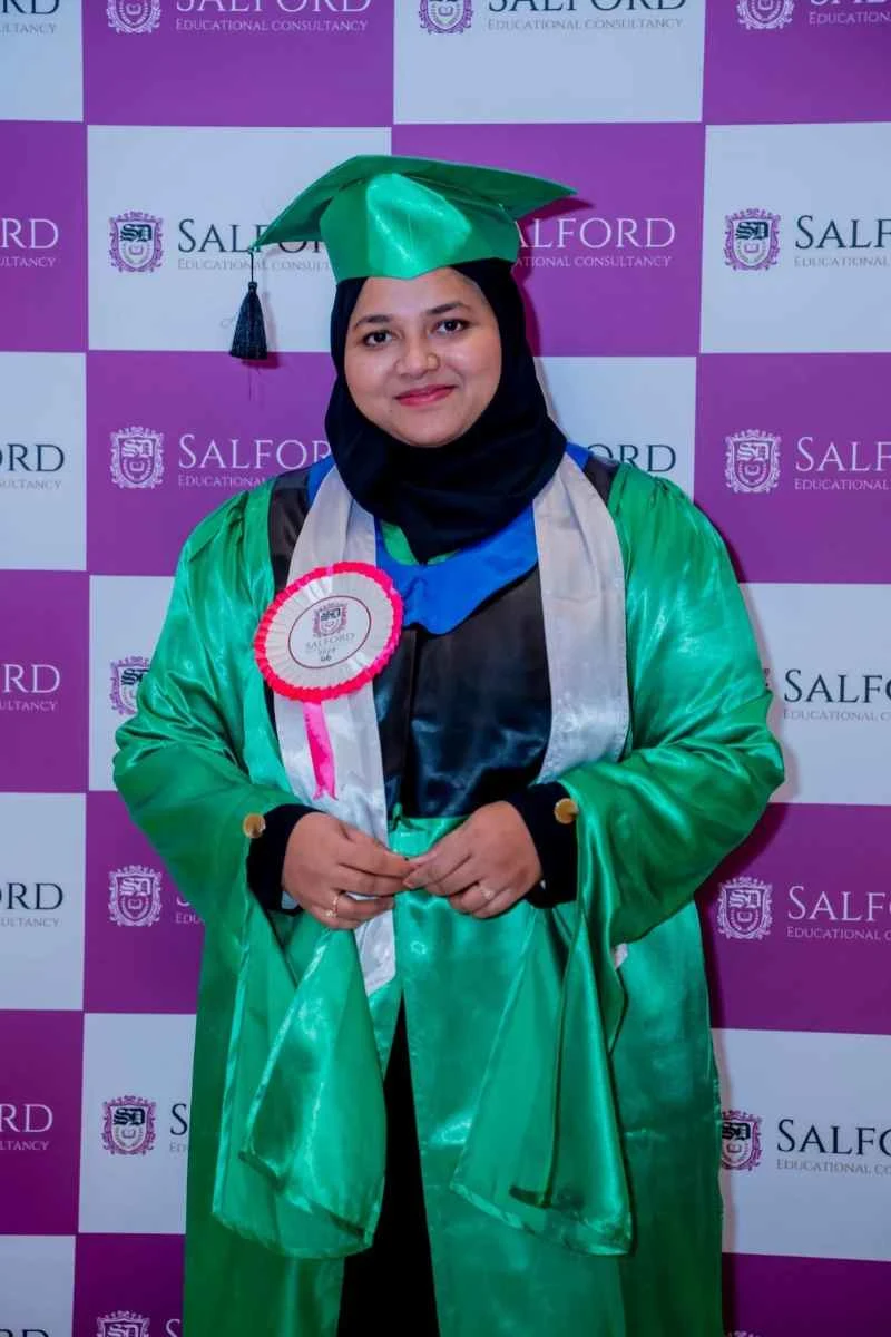 Online MBA graduate celebrating academic success in Qatar with Salford Educational Consultancy